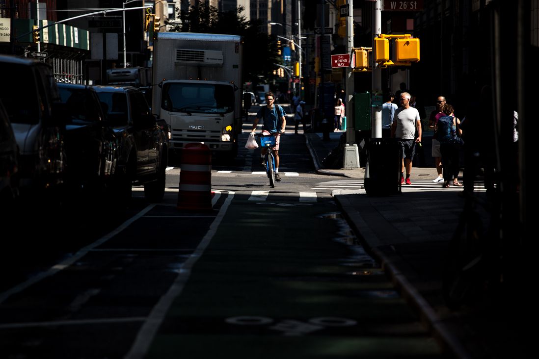A Citibike rider enters a new protected bike lane on Broadway south of West 26th Street.</br>
